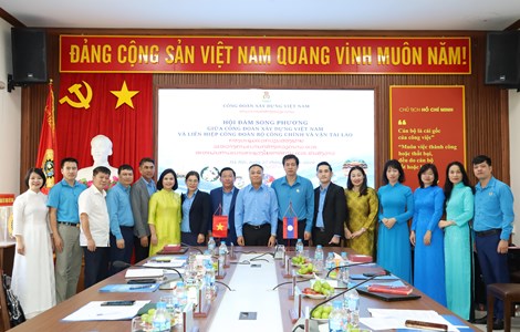 Công đoàn Xây dựng Việt Nam hội đàm với Liên hiệp Công đoàn Bộ Công chính và Vận tải Lào